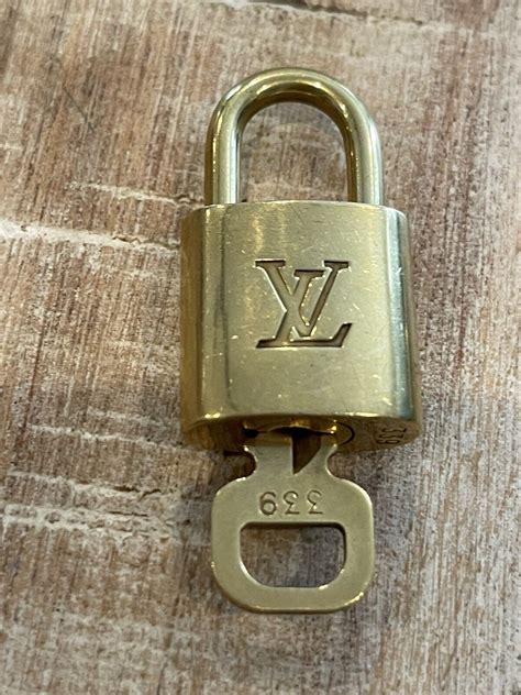 louis vuitton screws|authentic louis vuitton padlock.